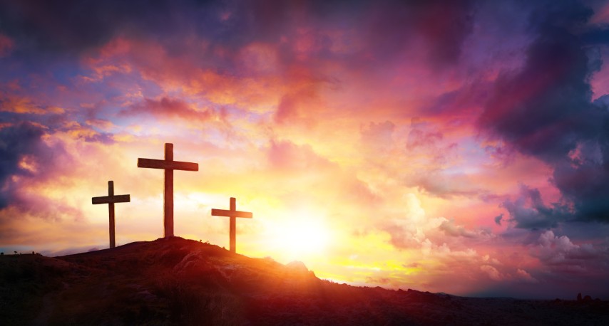 Three Crosses On Mountain With Red Clouds